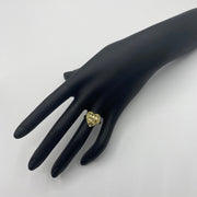 10k Gold ring with mesh heart shape design on a black mannequin hand 