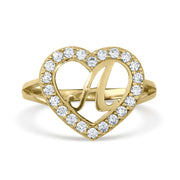 Yellow gold initial ring with a cursive letter A centered inside a cubic zirconia heart.