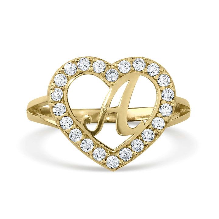 Yellow gold initial ring with a cursive letter A centered inside a cubic zirconia heart.