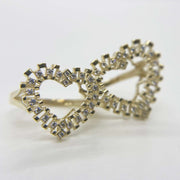 10k Gold heart shape ring with Cubic Zirconia accents on a white background