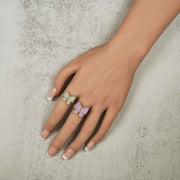 10k gold luxe butterfly rollie band rings with white and pink cubic zirconia.