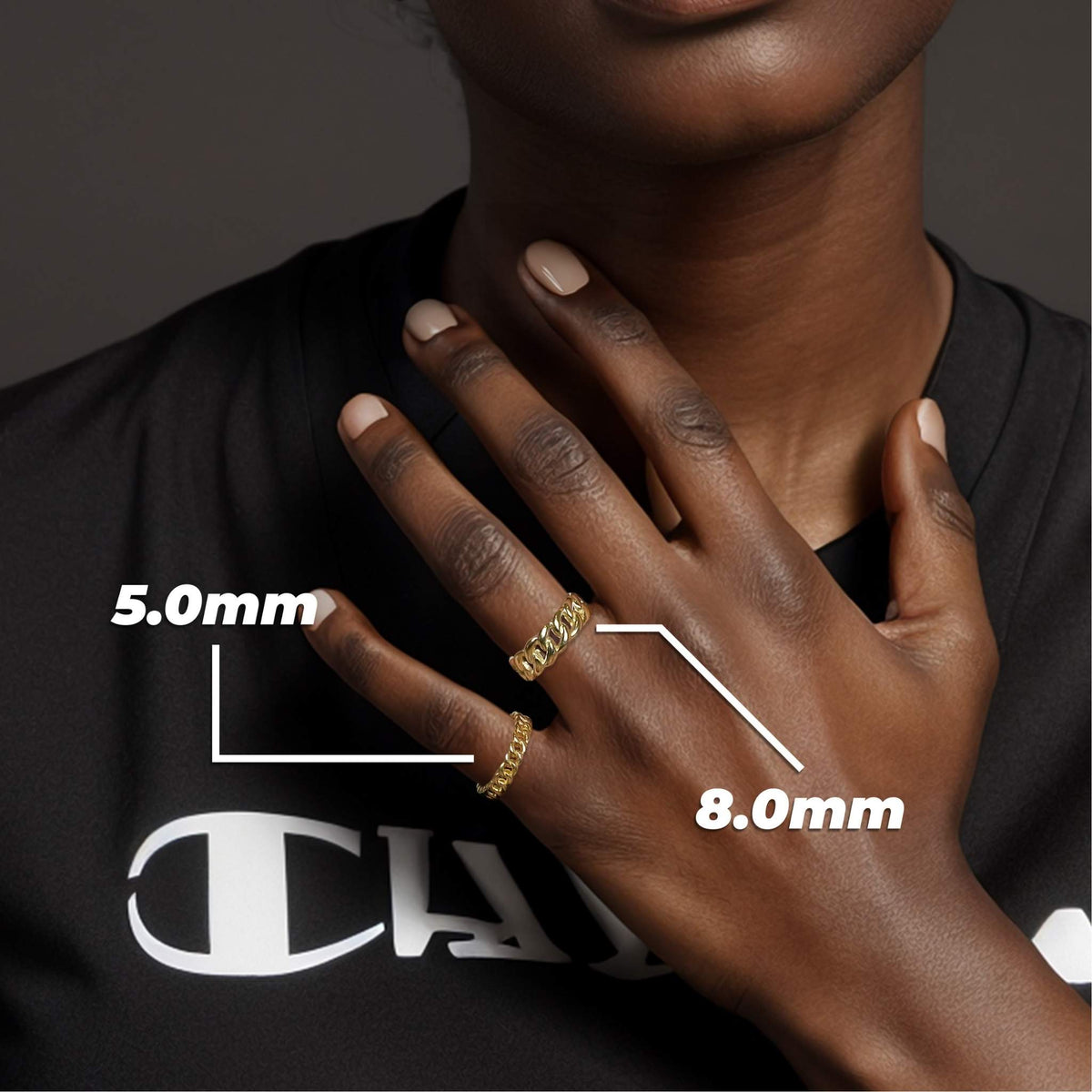 Model wearing 5mm and 8mm thick 10k yellow gold Cuban link band rings.
