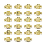 Grid display of 10k gold luxe rectangular signet rings showing various alphabet letters.