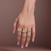 Lifestyle shot showcasing multiple script variations of the 10k gold round initial ring.