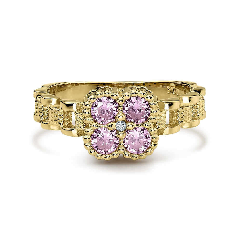 10k yellow gold link band ring with a square pink gemstone flower cluster.