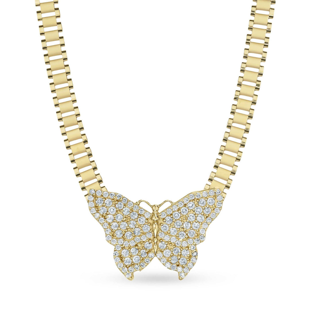 Gold butterfly pendant encrusted with clear cubic zirconia on a link chain.