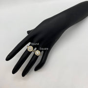 Two 10k gold rings on a black mannequin hand with Round and Square labels.