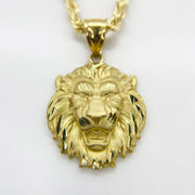 10k yellow gold matte lion head pendant on a rope chain against white background.