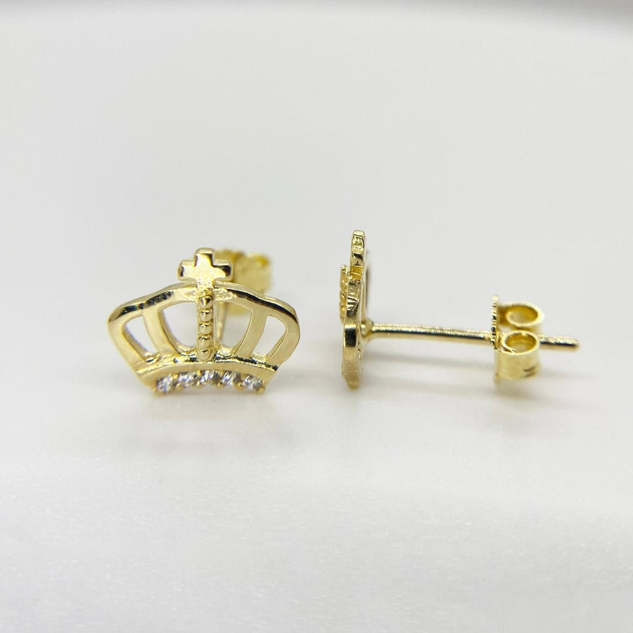 Front and side view of 10k gold crown-shaped stud earrings featuring sparkling cubic zirconia accents.