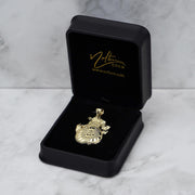 10k gold money loot bag pendant displayed inside an open black jewelry box.