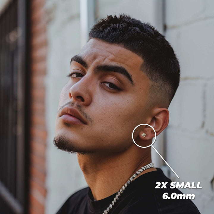 Male model wearing the 6.0mm 2X Small gold square cubic zirconia stud earring.
