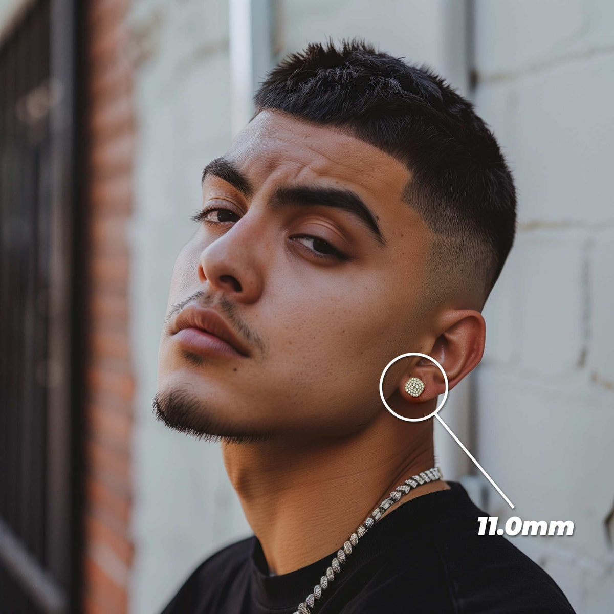 Male model wearing the 11.0mm gold iced round square CZ stud earring.