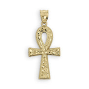 A gold Ankh pendant with a textured, beaded surface and a polished bail on a white background.