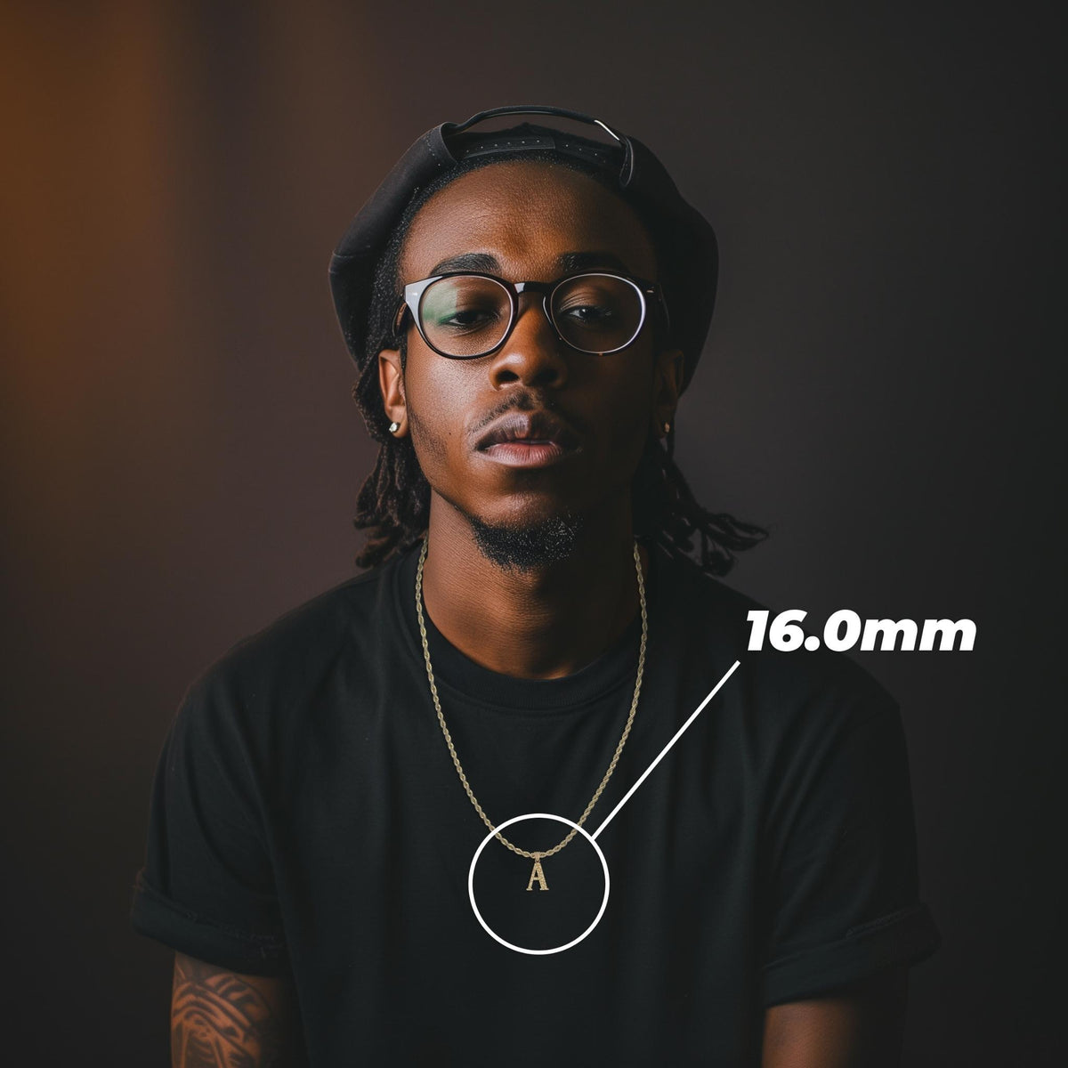 Man modeling a 16mm gold nugget letter 'A' pendant necklace with size callout.