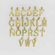10k yellow gold nugget alphabet initial letter pendants displayed on white background