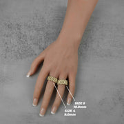 Size guide showing two gold watch-link rings worn horizontally on a hand model.