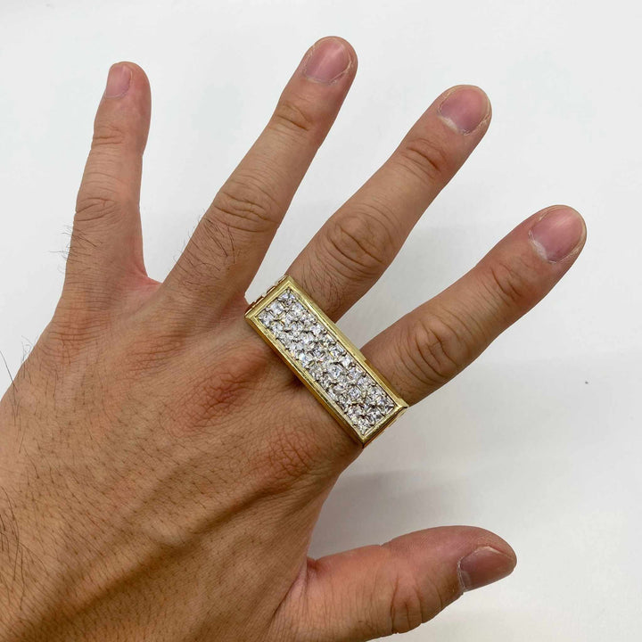 Hand wearing a 10k Princess Two Finger ring with Cubic Zirconia 