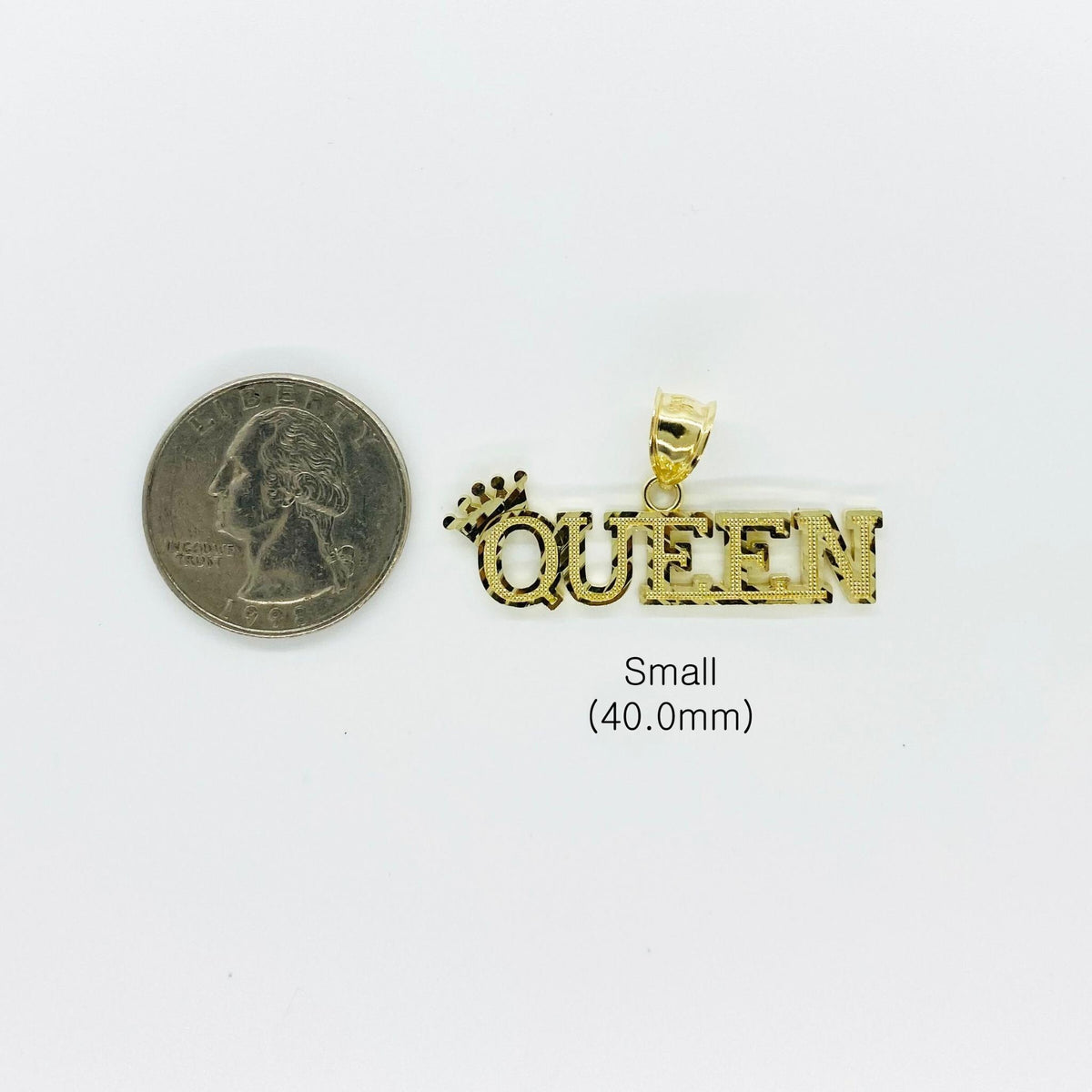 Small 10k gold diamond-cut "QUEEN" crown pendant displayed next to a US quarter for scale.