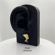Small 14.8mm 10k gold Queen Nefertiti stud earring on a black display stand.