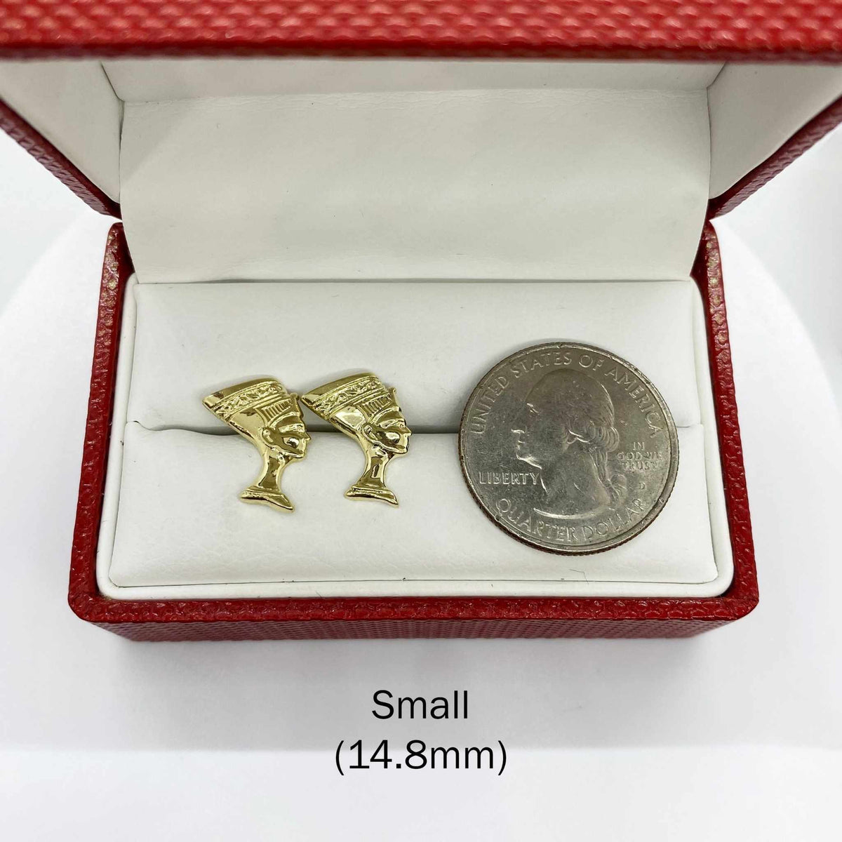 Small 14.8mm 10k gold Queen Nefertiti stud earrings next to a U.S. quarter for scale.