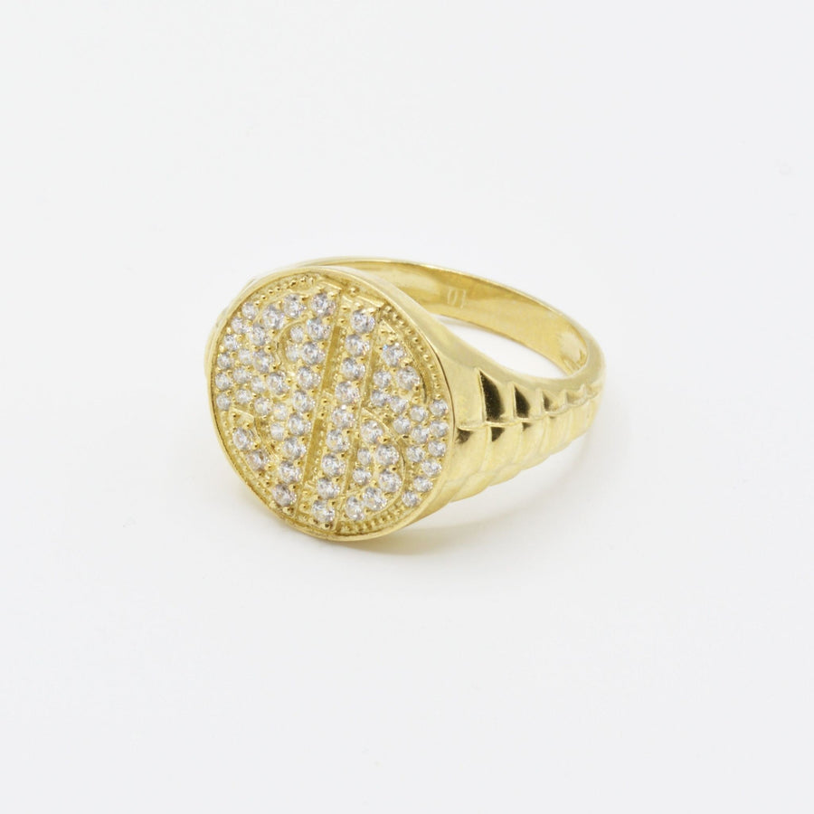 10k Gold Relic Money Sign ring with Cubic Zirconia accents on a white background