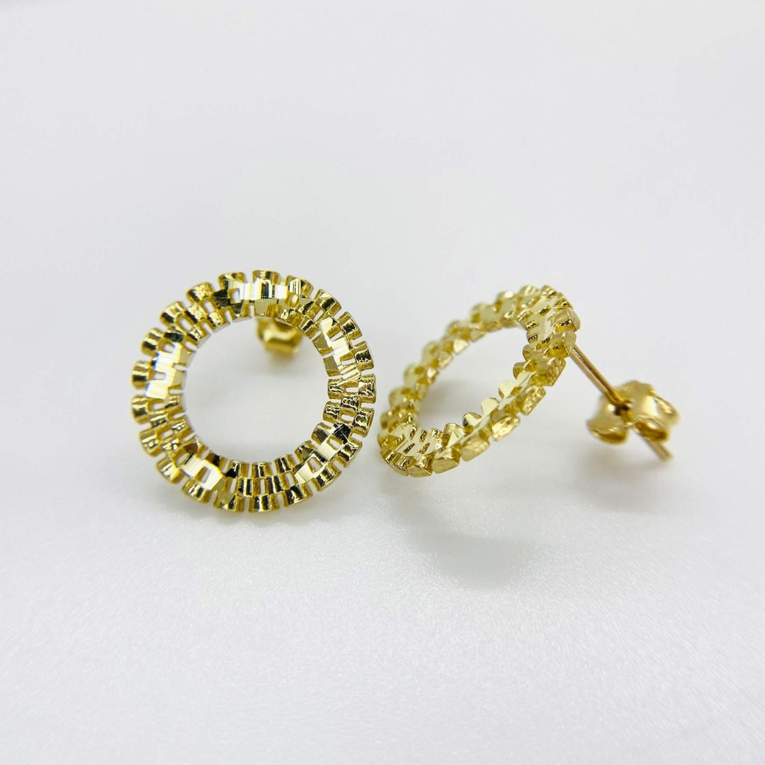Pair of 10k yellow gold round stud earrings with a textured, beaded edge design.