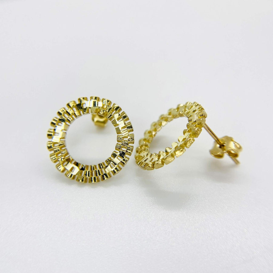 Pair of 10k yellow gold round stud earrings with a textured, beaded edge design.