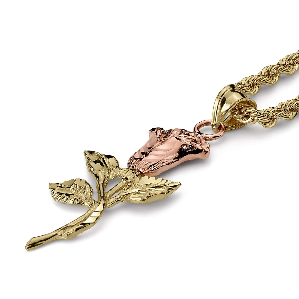 A close-up of a gold and rose gold pendant featuring a rose bud on a branch, attached to a twisted rope chain,