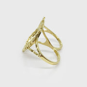 Side-angle view of a 10k gold heart-shaped two-finger ring showcasing its open profile.
