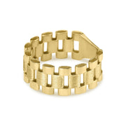 Textured gold Rolex style band ring shown from a side angle on white background.