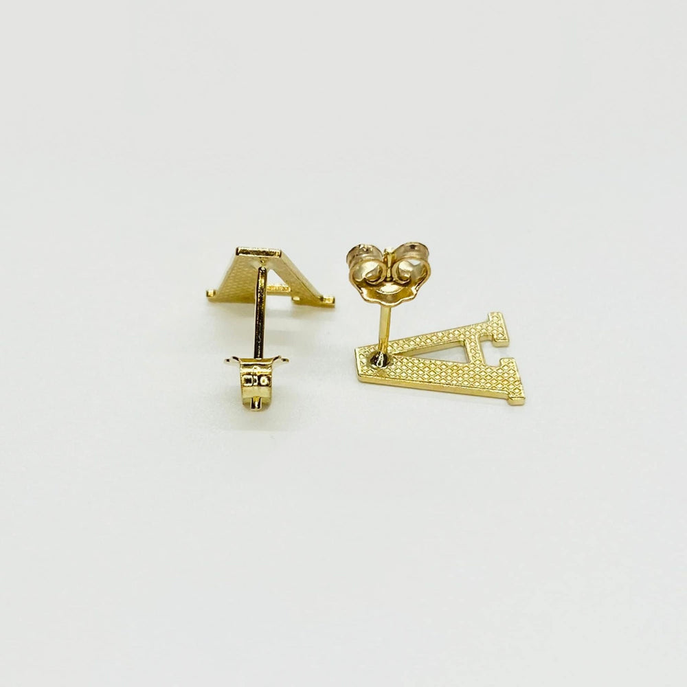 Rear view of gold initial letter 'A' stud earrings with secure push-back closures.
