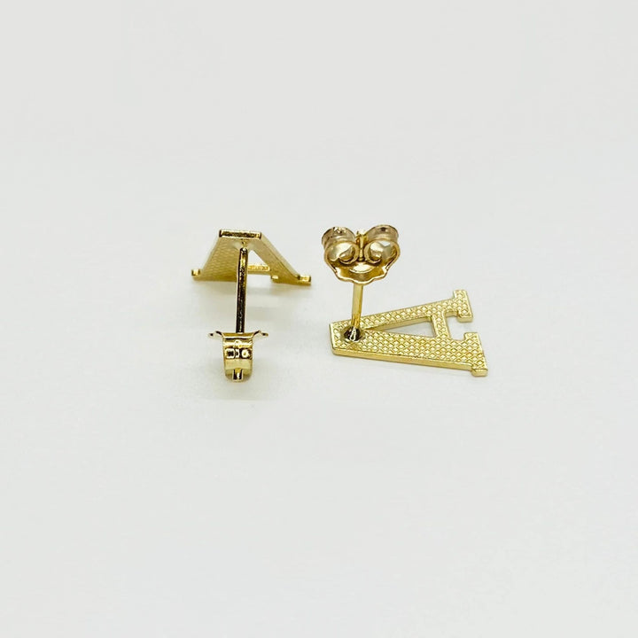 Rear view of gold initial letter 'A' stud earrings with secure push-back closures.