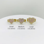 Three pink sparkle heart-shaped rings in small, medium, and large sizes 