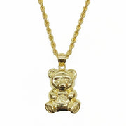 10k yellow gold teddy bear pendant charm attached to a gold rope chain necklace.
