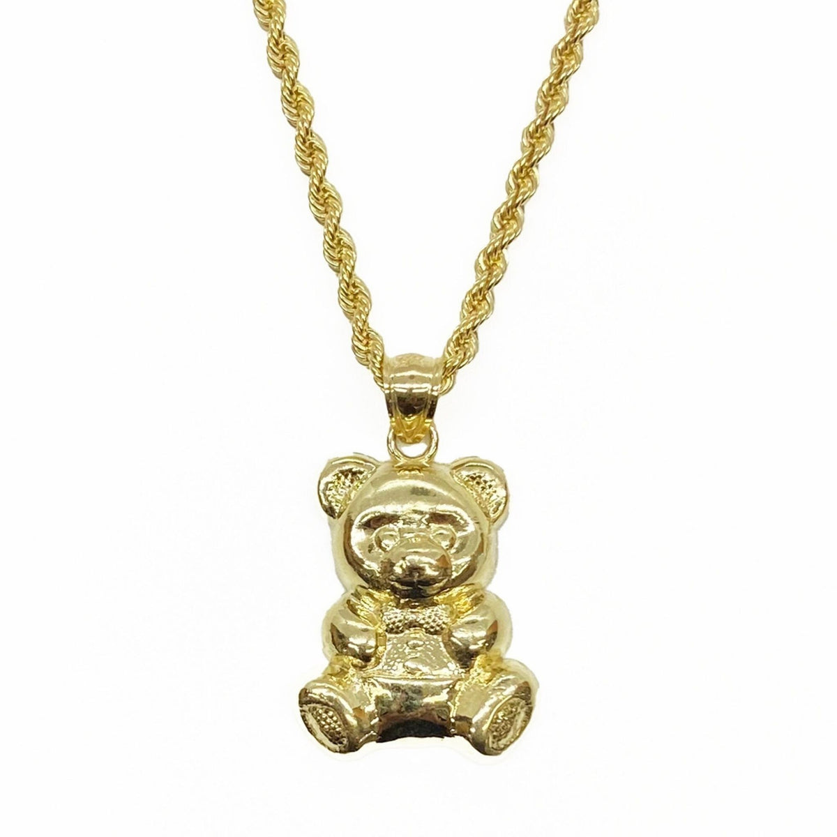 10k yellow gold teddy bear pendant charm attached to a gold rope chain necklace.