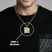 Model wearing a gold trap house pendant with Size 4 38.0mm label.