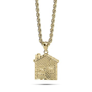 10k gold Trap House DC house-shaped pendant necklace featuring diamond-cut brick detailing.