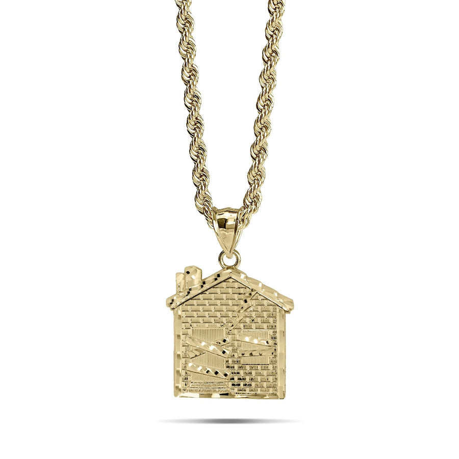 0k yellow gold trap house pendant hanging from a classic rope chain.
