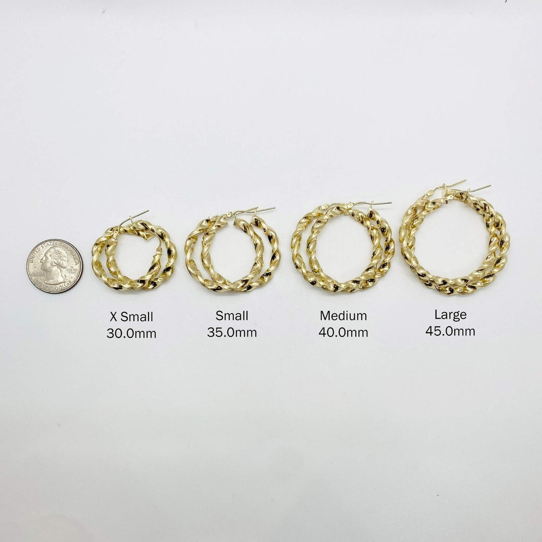 10k gold twisted hoop earrings extra small to large size guide with quarter coin.