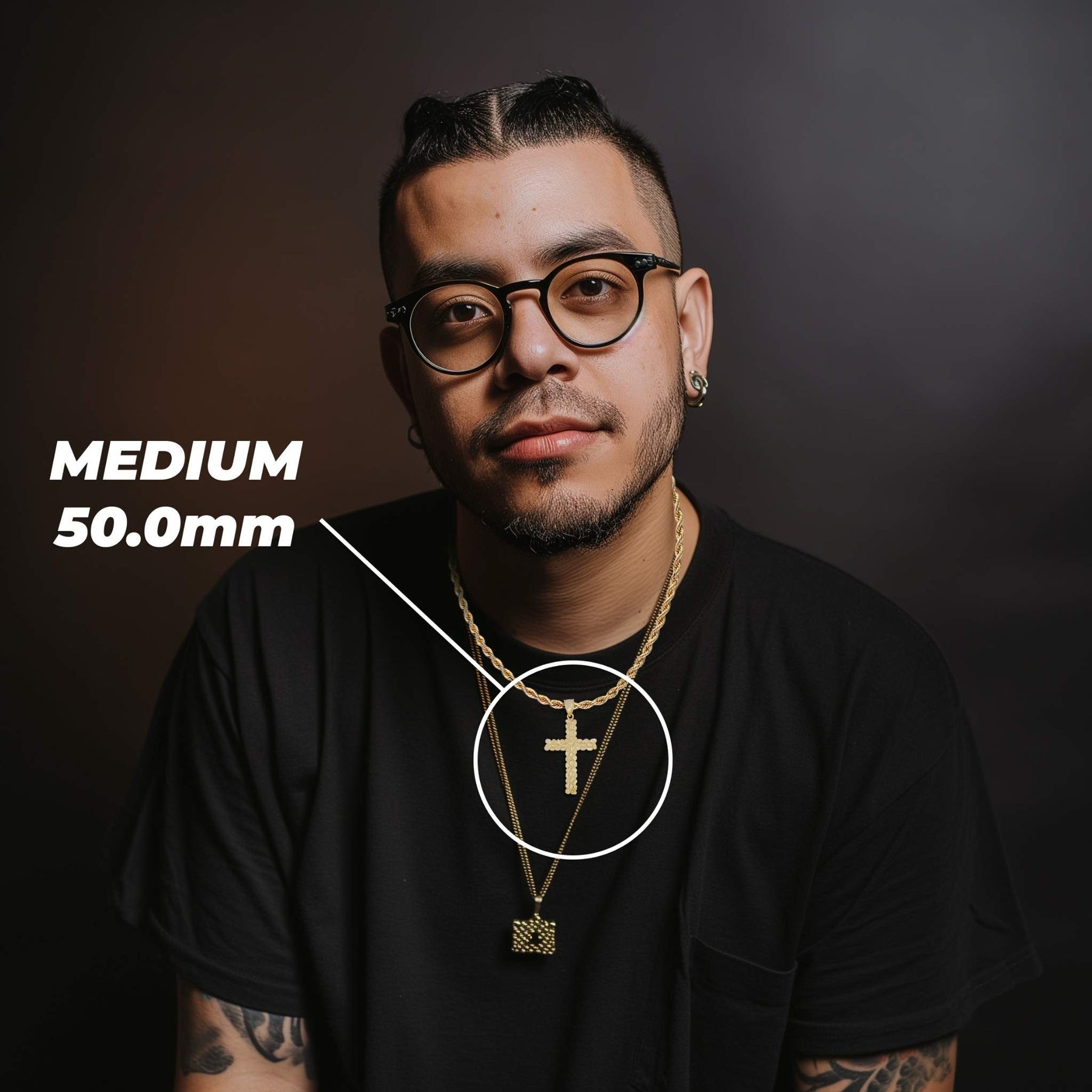 Man wearing the 10k Gold Vintage Nugget Cross Pendant showing Medium 50.0mm dimensions.