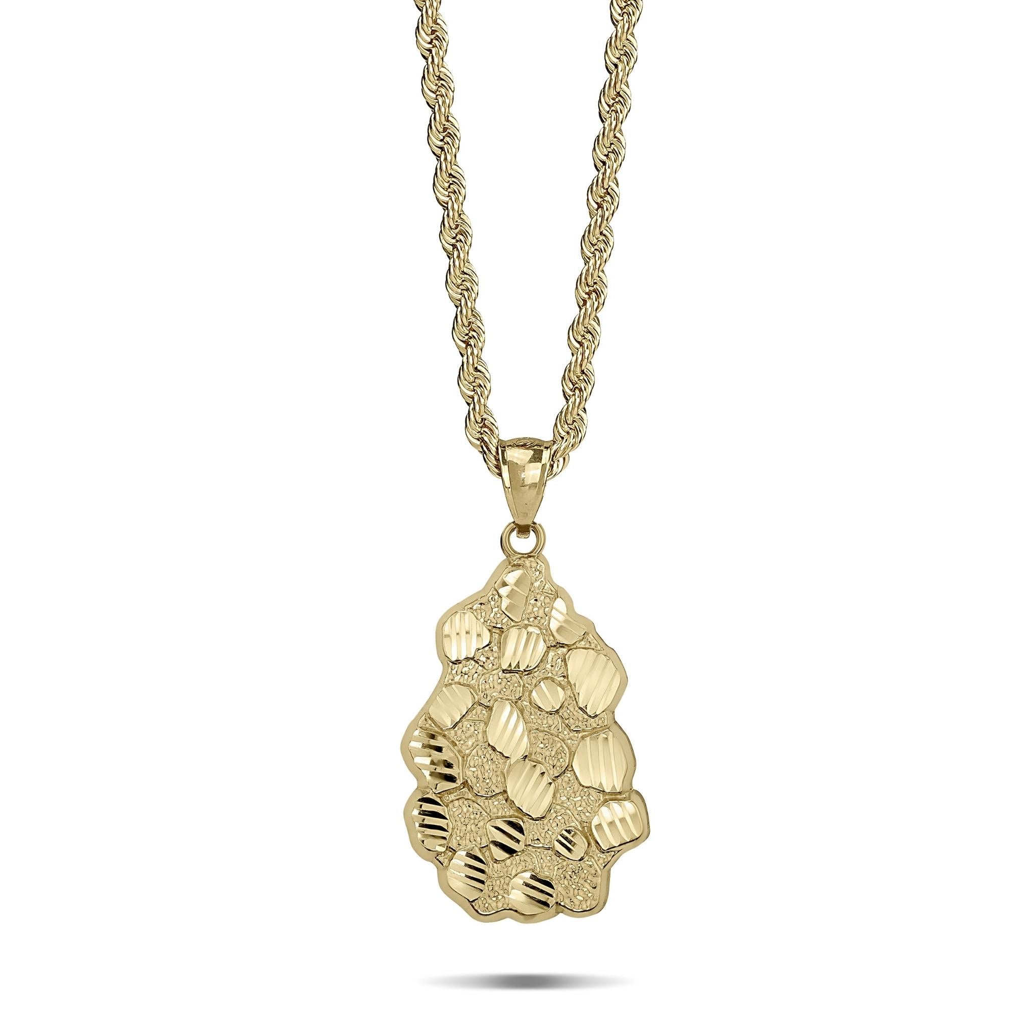 A 10k yellow gold vintage nugget pendant featuring a diamond-cut textured finish on a rope chain.