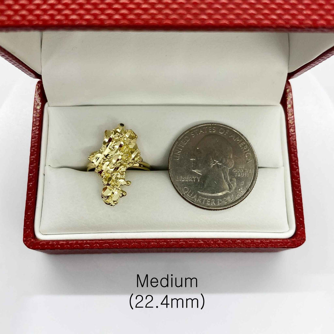 10k Gold Vintage Nugget ring in a red open box with a silver coin for scale on a white background