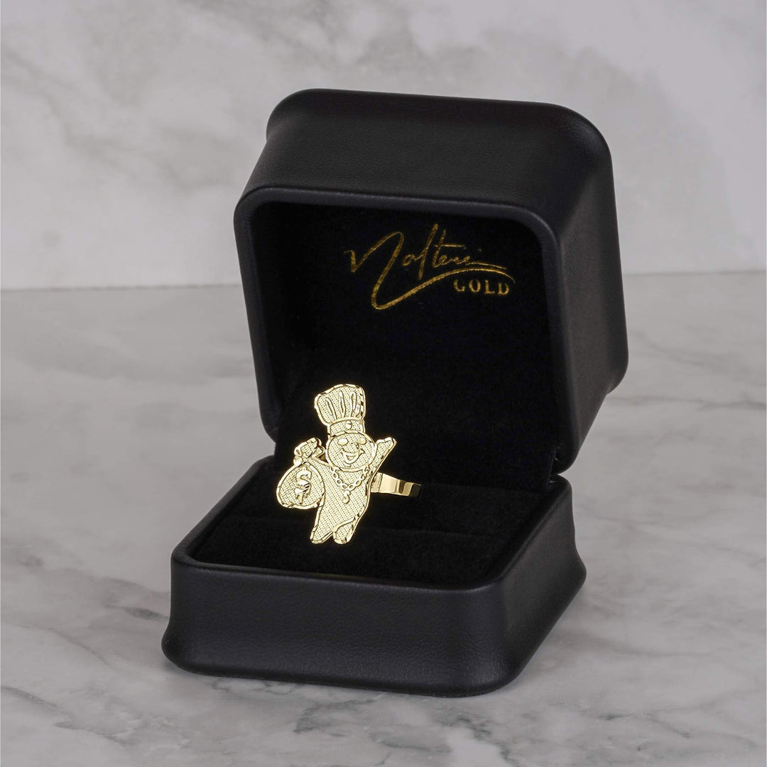 Textured gold Pillsbury Doughboy ring with a diamond-cut finish presented in a jewelry box.