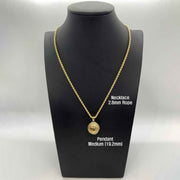 Medium 19.2mm 10k gold 3D world globe pendant on a rope chain on a mannequin.