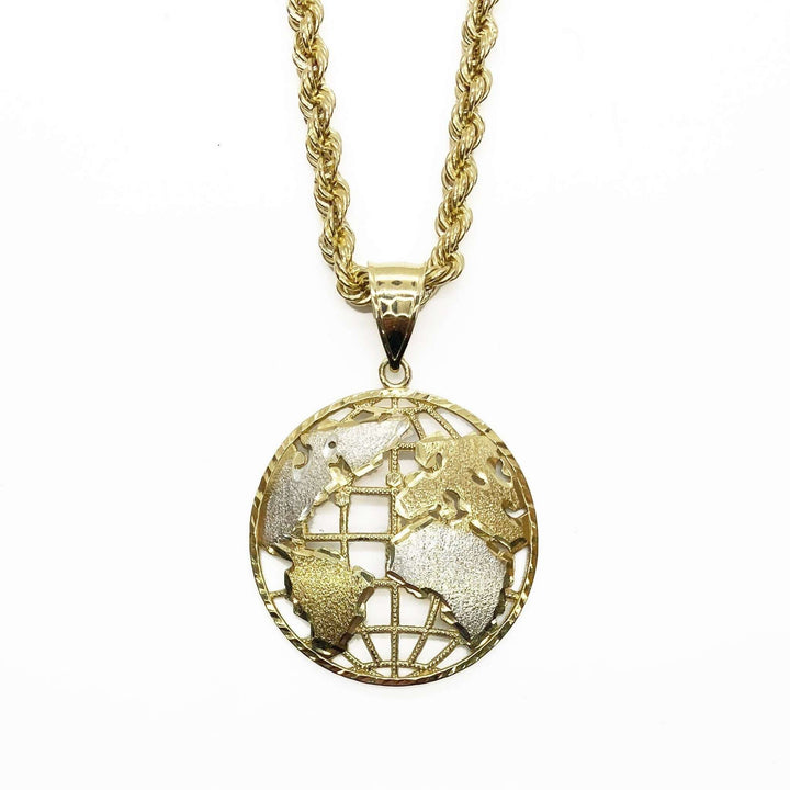 Two-tone gold circular globe pendant with textured silver continents on a gold rope chain.