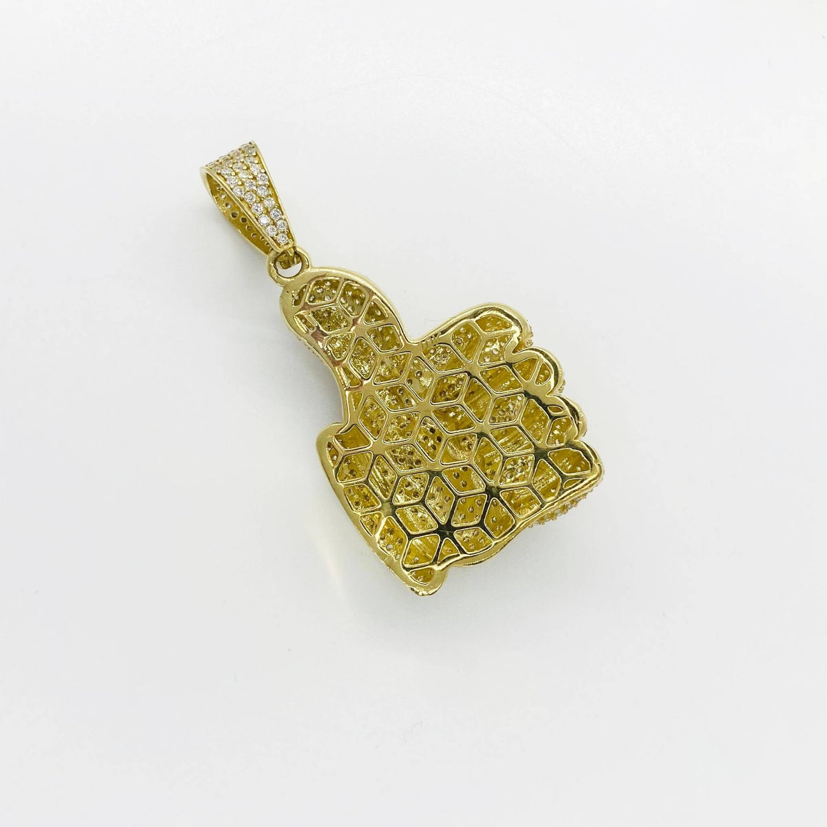 Back view of a 10k yellow gold thumbs up CZ pendant showing the hollow grid structure.