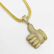 10k yellow gold iced-out thumbs up CZ pendant on a Franco chain.
