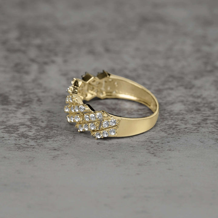10K yellow gold Kyrix iced CZ Cuban chain ring showing band detail.
