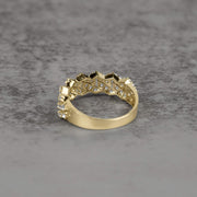 Rear view of a gold Cuban link band ring showing the smooth inner band.