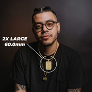 Model styled with 2X Large size Pamp Suisse Lady Fortuna pendant necklace and measurement overlay.